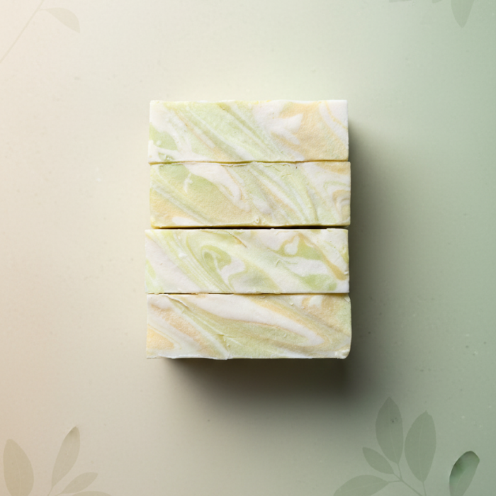 Marbled soap bars on a light green background