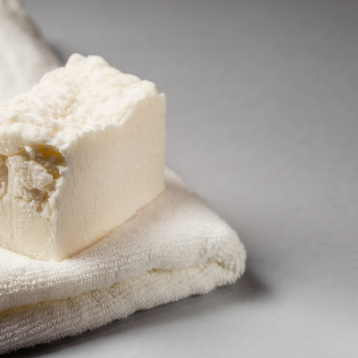 Soap bar on a white towel