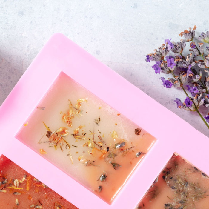 Soap decorated in a mold with herbs