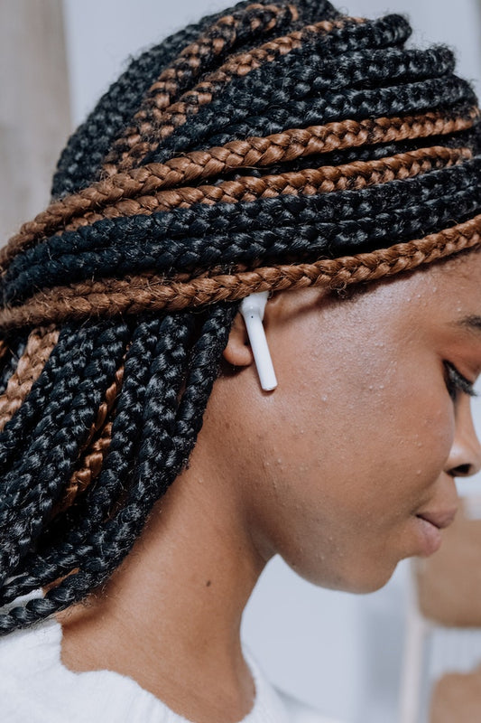Photo by cottonbro studio: https://www.pexels.com/photo/woman-with-braided-hair-wearing-white-earbuds-5081401/