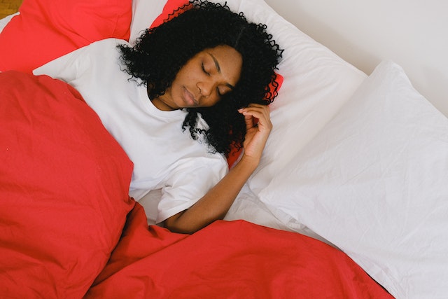 Beauty Sleep Baobab SwirlsPhoto by SHVETS production: https://www.pexels.com/photo/relaxing-black-woman-lying-on-soft-bed-with-red-blanket-7191951/