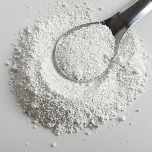 Spoon filled with titanium dioxide 