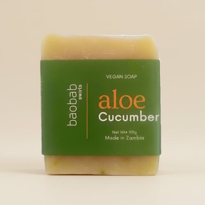 Baobab Swirls bar of soap with aloe and cucumber scent on a beige background