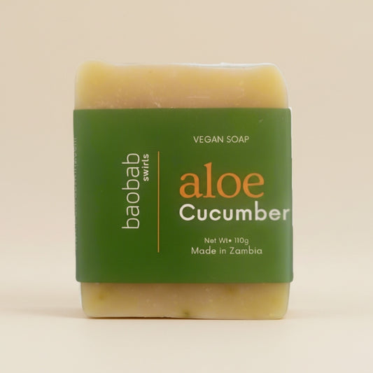 Baobab Swirls bar of soap with aloe and cucumber scent on a beige background