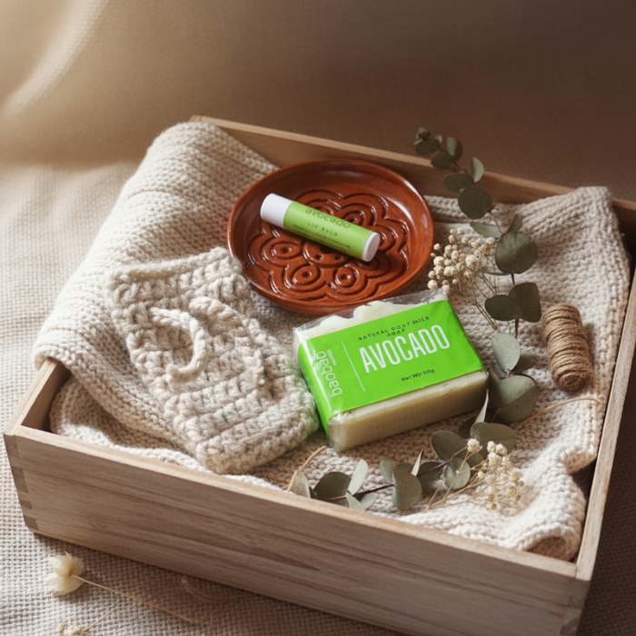Bar of soap labeled 'Avocado' on a textured surface with decorative elements