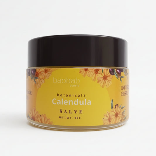 Calendula salve jar from Baobab Swirls on a beige background