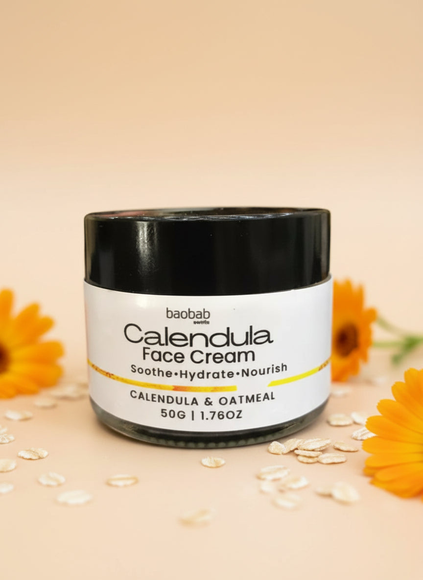 Baobab Calendula Face Cream jar on a dark background