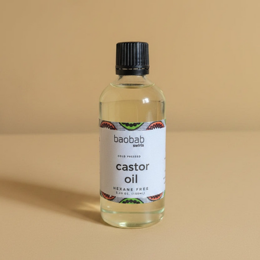 Bottle of baobab swiss castor oil on a beige background
