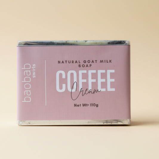 Bar of soap labeled 'Coffee Cream' by baobab swiss on a beige background