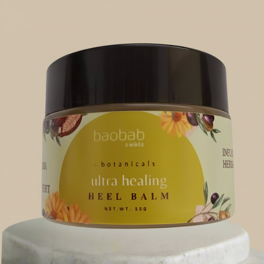 Jar of baobab botanicals ultra healing heel balm on a beige background