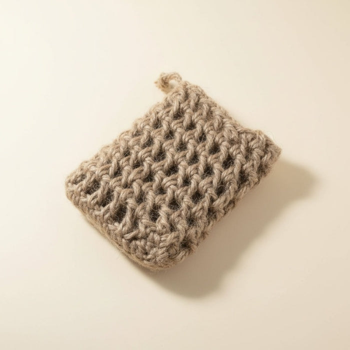 Textured soap  saver  on a light beige background