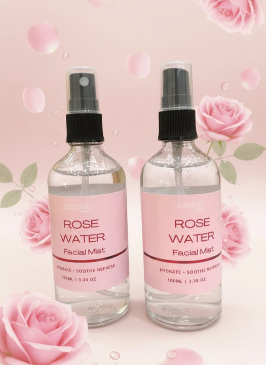 Two bottles of rose water facial mist on a black background