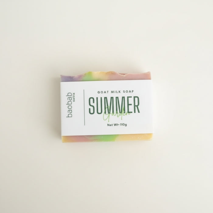 Baobab swirls Bar of soap with a colorful packaging labeled 'Summer' on a light background 