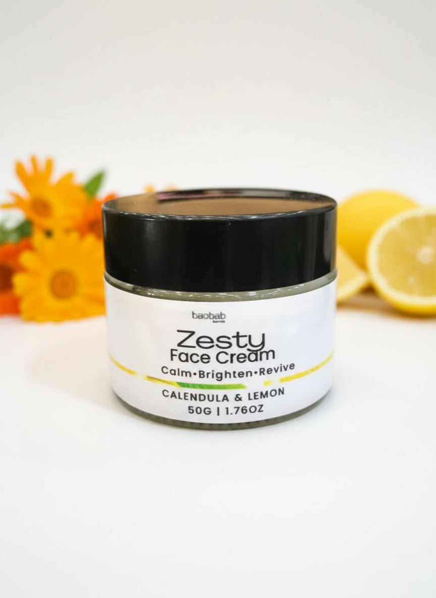 Jar of Zesty Face Cream with black lid on a dark background